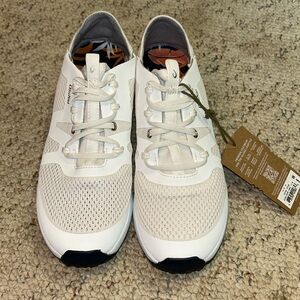 Olukai brand new tennis shoes. Never worn
